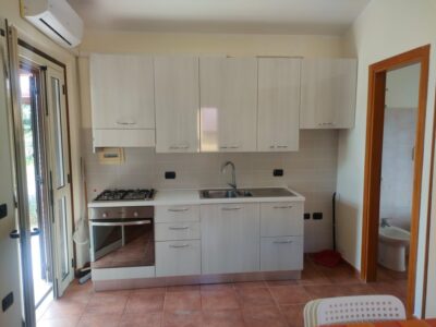 Casetta con giardino a Capo Bianco